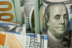 Đồng USD tăng giá trước giờ công bố dữ liệu kinh tế Mỹ