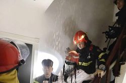 Kịp thời cứu nạn nhân trong đám cháy ngôi nhà 7 tầng