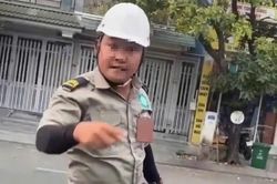 Công an xác minh vụ người đàn ông mặc đồ bảo vệ đe dọa tài xế ô tô ở TPHCM