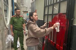 Cô gái bị bắt tạm giam vì tạt sơn nhà người yêu cũ