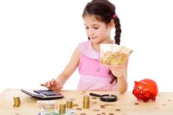 Dạy trẻ quản lý tiền tiêu vặt từ sớm giúp hình thành thói quen tiêu dùng thông minh