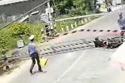 Thông tin về người bị nhân viên đường sắt đá khi tông gãy gác chắn tàu