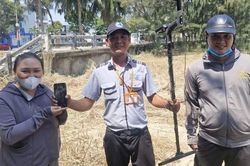 Tìm được điện thoại vùi suốt 5 ngày ở biển Đà Nẵng