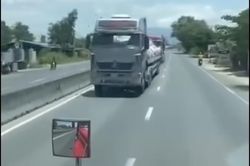 Thực hư 2 xe tải chạy ngược chiều trên Quốc lộ 1