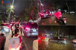 Mưa lớn kèm gió giật khiến nhiều tuyến đường Hà Nội ùn tắc