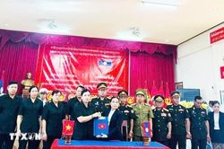 Bàn giao hài cốt liệt sỹ quân tình nguyện và chuyên gia Việt Nam hy sinh tại Lào về nước