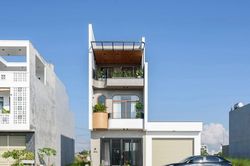 Nhà phố vuông vức nhưng không nhàm chán nhờ thiết kế lệch tầng