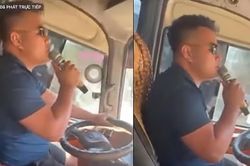 Tài xế vừa điều khiển ô tô vừa hát karaoke