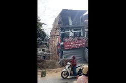 Nhà bị nứt, nghiêng do công trình liền kề đào móng: Quy định bồi thường và trách nhiệm pháp lý