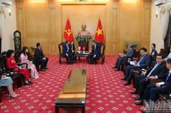 Đồng chí Đoàn Minh Huấn tiếp Đoàn Đảng Hành động Nhân dân Singapore và Đoàn Đảng Mặt trận Cách mạng vì một Timor-Leste độc lập