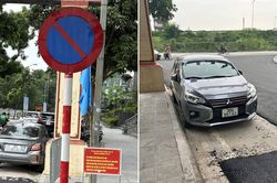 Ô tô Mitsubishi Attrage đỗ lề đường, đơn vị thảm nhựa mặt đường phải 'né xe'