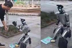 Robot hình người quỳ giữa phố xin tiền bằng mã QR khiến mạng xã hội xôn xao