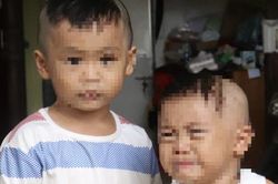 Hai trẻ nhỏ ướt đẫm trong mưa vì bị bỏ rơi trước cổng chùa