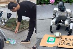 'Robot ăn xin' quỳ giữa phố với tấm biển 'xin trả tiền điện', còn nhận chuyển khoản qua mã QR khiến dân mạng tranh cãi dữ dội