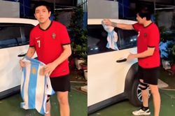 Ca sĩ Tim hứng chỉ trích dữ dội khi dùng áo của đội tuyển Argentina để lau xe