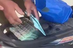 Nam thanh niên chảy máu mặt nằm bất tỉnh giữa đường, trong cốp xe có gần 400 triệu đồng