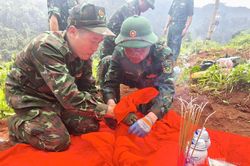 Quy tập 1 h&agrave;i cốt liệt sĩ v&agrave; 1 ng&ocirc;i mộ tập thể tại x&atilde; Minh T&acirc;n