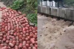 3000 bình gas bị nước lũ cuốn trôi xuống sông, người dân lao ra vớt