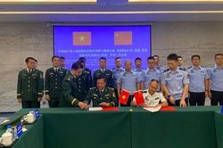 Hội đàm giữa các Đồn biên phòng tỉnh Lào Cai và Trạm Kiểm tra biên phòng xuất nhập cảnh Hà Khẩu (Trung Quốc)