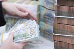 Tỷ giá ngoại tệ ngày 11/7: USD bán ra 26.470 đồng, Dinar Kuwait bán ra hơn 89.000 đồng