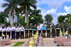 Thăm, động viên lực lượng làm nhiệm vụ khai quật, lấy mẫu hài cốt liệt sĩ tại Nghĩa trang Liệt sĩ Tông Khao