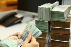 Ng&acirc;n h&agrave;ng Nh&agrave; nước: Dự &aacute;n đầu tư ra nước ngo&agrave;i được vay tối đa 70% vốn