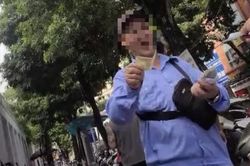 Thu gấp đôi giá vé tại bãi xe trước cổng Bệnh viện Phụ sản Trung ương, một nhân viên bị công an triệu tập