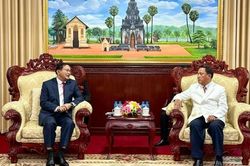 Bí thư Tỉnh ủy Savannakhet (Lào) tiếp Tổng Lãnh sự Việt Nam Nguyễn Văn Dũng