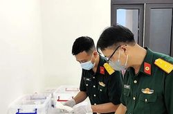 B&agrave;n giao gần 1.400 mẫu h&agrave;i cốt liệt sĩ phục vụ x&eacute;t nghiệm ADN