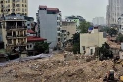 3 gia đình chung một sổ đỏ, đất cạnh dự án làm đường có được tách thửa?