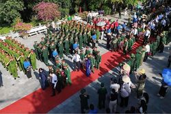 Trang nghiêm Lễ viếng, truy điệu và an táng hài cốt 34 liệt sĩ tại Nghĩa trang Liệt sĩ Quốc gia Vị Xuyên