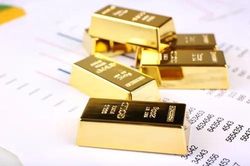 Giá vàng thế giới tiếp tục chịu áp lực trước thềm quyết định lãi suất của Fed
