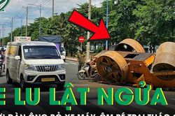 Xe lu lật ngửa giữa đường, người đàn ông bỏ xe máy ôm bé trai tháo chạy