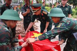 Hà Nội đẩy nhanh tiến độ lấy mẫu hài cốt liệt sĩ