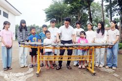 Ðể tiếng đàn đá mãi vang xa