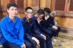 Nh&oacute;m thanh ni&ecirc;n trong đường d&acirc;y sản xuất, mua b&aacute;n, ti&ecirc;u thụ tiền giả l&atilde;nh &aacute;n