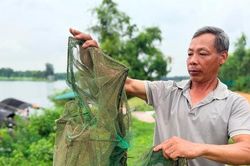 Cần làm rõ việc cấm người dân đánh bắt thủy sản trên sông Thiếp