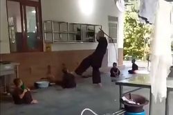 Điều tra vụ người đàn ông mặc áo nâu cầm roi đánh trẻ tại chùa Bầu