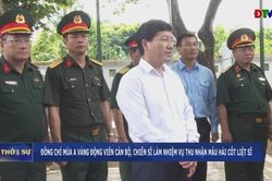 Đồng ch&iacute; M&ugrave;a A Vảng động vi&ecirc;n c&aacute;n bộ, chiến sĩ l&agrave;m nhiệm vụ thu nhận mẫu h&agrave;i cốt liệt sĩ