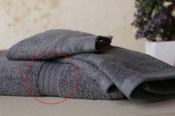 Tưởng chỉ để làm đẹp, những đường dệt ngang trên khăn tắm thực ra có 5 công dụng