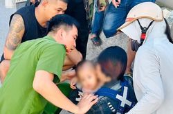 Người mẹ trẻ &ocirc;m con nhỏ l&ecirc;n cầu định tự tử