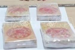Bắt giữ hai đối tượng vận chuyển trái phép 15 bánh heroin