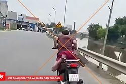Xử lý nam thanh niên nằm sấp trên yên khi điều khiển xe máy