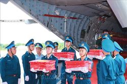 Bàn giao hơn 7.000 mẫu hài cốt liệt sĩ phục vụ giám định ADN