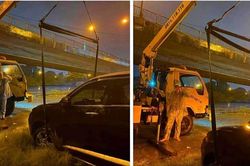 Cứu hộ ô tô sập gầm giữa đêm mưa tầm tã, giá 1,2 triệu đồng là đắt hay rẻ?