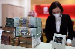Lãi suất qua đêm chỉ còn hơn 1%/năm
