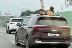 CSGT xử phạt nữ tài xế để 2 trẻ thò đầu qua cửa sổ trời trên cao tốc
