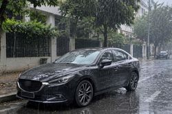Để xe ô tô ngoài trời mưa có nhanh hỏng?