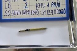 Phát hiện cây bút khắc tên người phụ nữ trong mộ liệt sĩ ở Quảng Ngãi