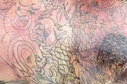 Phát hiện thi thể nam giới phân hủy nặng trên sông Đồng Nai, trên lưng nạn nhân có hình xăm rồng phủ kín